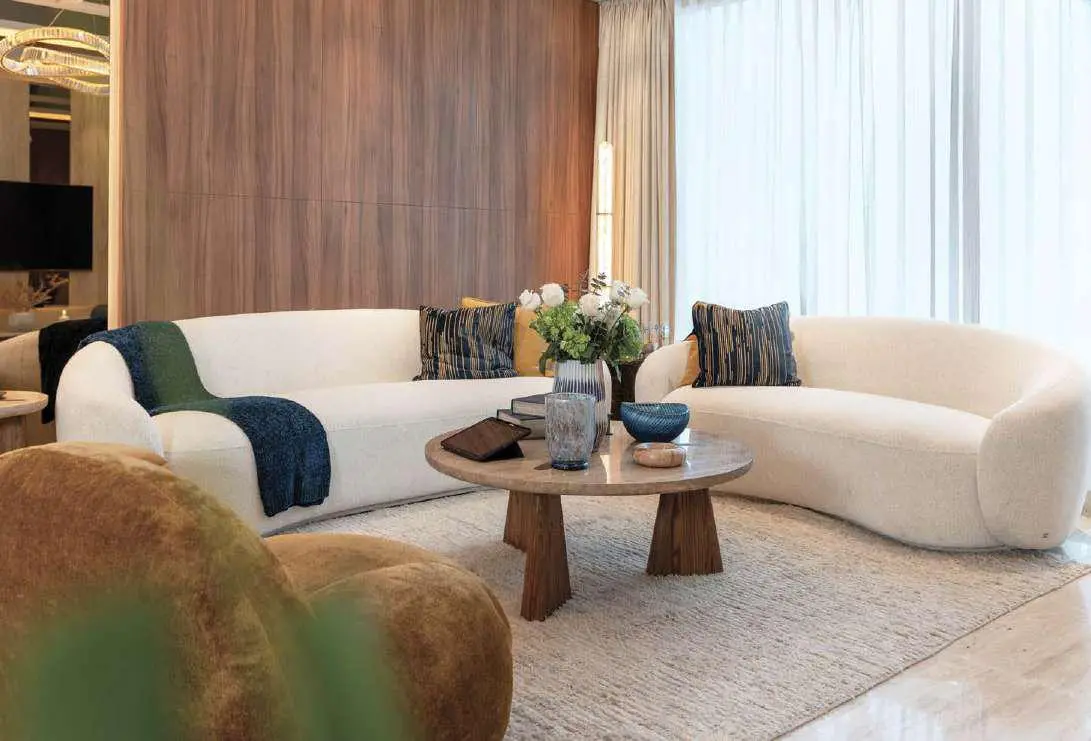 Custom timber walk in closet and spacious dressing room interior at Bab Al Qasr Residence 51 Al Raha Beach.