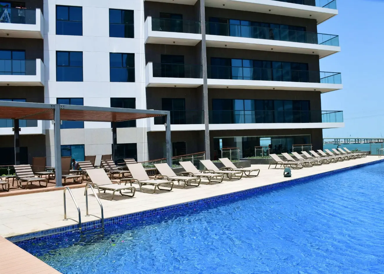 Modern high-rise residential exterior of Park View Tower in Shams Abu Dhabi on Al Reem Island near park