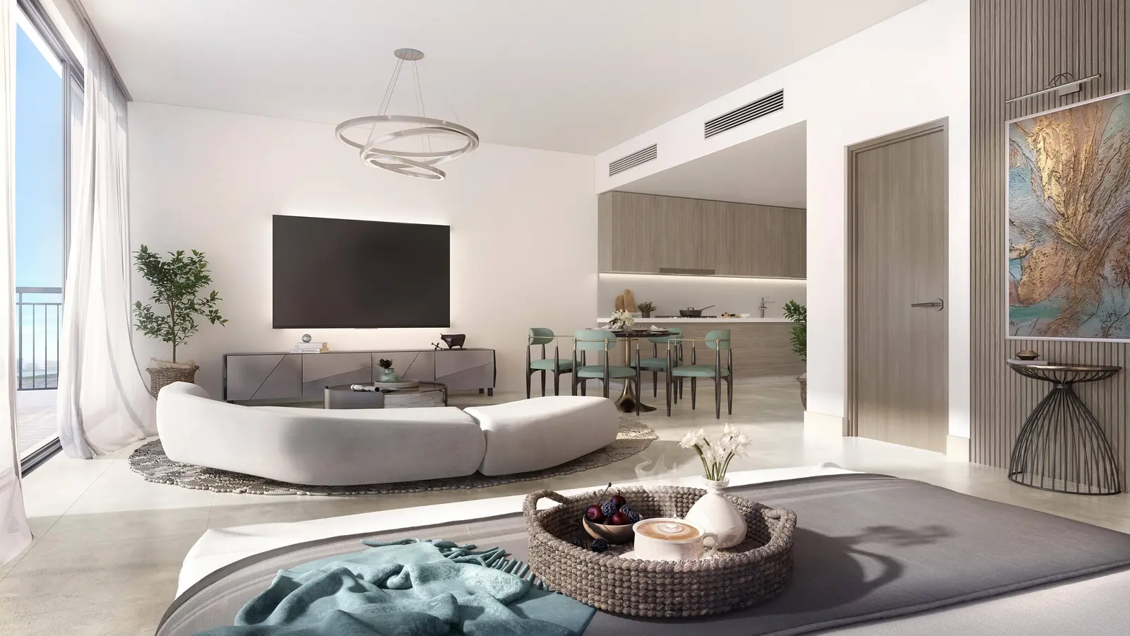 Kitchen with quartz countertop and built-in cabinets in Yas Golf Collection unit.