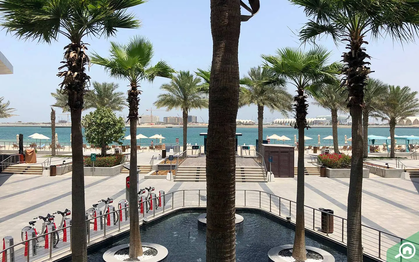 Al Dana island development featuring waterfront apartments in Al Raha Beach