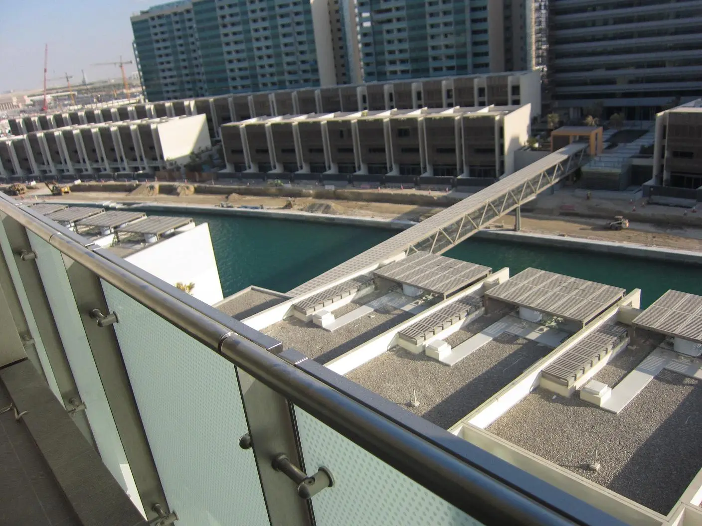 Modern architecture and villas in Al Muneera Al Raha Beach Abu Dhabi luxury waterfront development.
